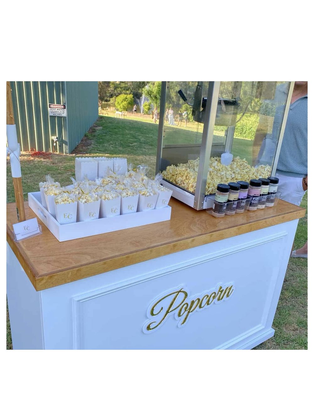 Popcorn cart close-up with flavour dusts