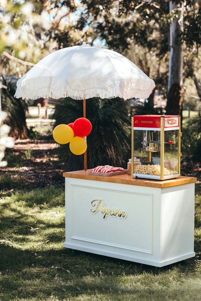 Popcorn cart as centrepiece at children's birthday party